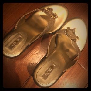 Like new gold Guess wedge flip flops